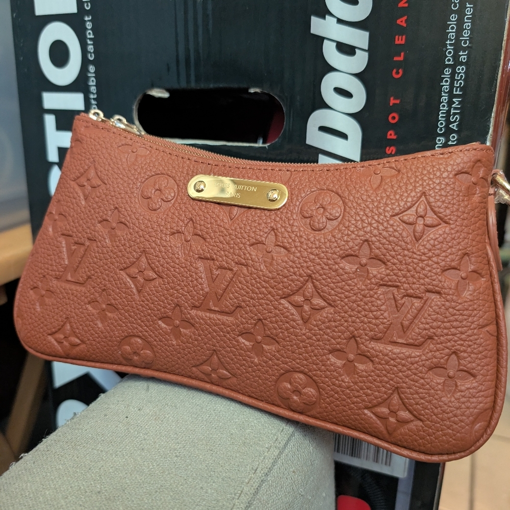 Louis Vuitton Brown Monogram Clutch